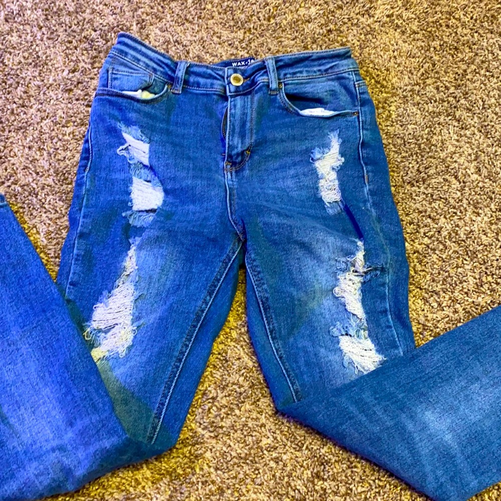 Wax jeans distressed and high waisted.